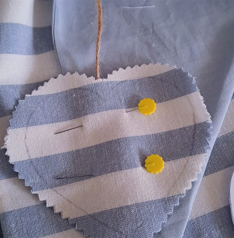 Dettagli fiocco Tommaso