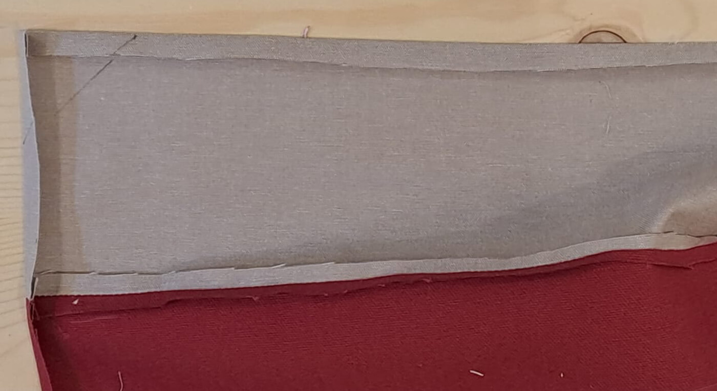 Dettaglio centimetri di cucitura stirato