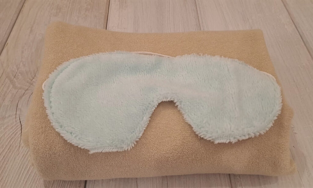 Fascetta occhi per la notte in spugna di bambù, con mano morbida, elastico regolabile, altro lato in cotone.